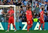 Real Madrid's Toni Kroos, left, Real Madrid's Luka Modric, centre, and Real Madrid's Nacho Fernandez walk on the pitch in dejection at the end of the Spanish La Liga soccer match between Real Sociedad and Real Madrid, at Anoeta stadium, in San Sebastian, northern Spain, Sunday, May 12, 2019. (AP Photo/Alvaro Barrientos)