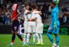 Marseille players celebrate after Lille's Gabriel scored an own goal during the French League One soccer match between Marseille and Lille at the Velodrome stadium in Marseille, southern France, Saturday, Nov. 2, 2019. (AP Photo/Daniel Cole)