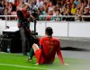Portugal's Cristiano Ronaldo sits on the pitch after getting injured during the Euro 2020 group B qualifying soccer match between Portugal and Serbia at the Luz stadium in Lisbon, Portugal, Monday, March 25, 2019. (AP Photo/Armando Franca)