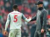 Liverpool manager Juergen Klopp, right, shakes hands with Liverpool's Georginio Wijnaldum at the end of the English Premier League soccer match between Manchester United and Liverpool at Old Trafford stadium in Manchester, England, Sunday, Feb. 24, 2019. (AP Photo/Jon Super)