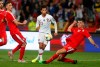 Portugal's Joao Felix, centre, kicks the ball ahead of Serbia's Nemanja Matic, left, and Serbia's Nikola Milenkovic during the Euro 2020 group B qualifying soccer match between Serbia and Portugal, on the stadium Rajko Mitic in Belgrade, Serbia, Saturday, Sept. 7, 2019. (AP Photo/Darko Vojinovic)