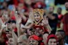 Fans of Brazil's Flamengo soccer team cheer before a Copa Libertadores soccer match against Uruguay's Penarol at Maracana stadium in Rio de Janeiro, Brazil, Wednesday, April 3, 2019. (AP Photo/Silvia Izquierdo)