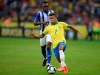 Brazil's David Neres, front, dribbles past Honduras' Alberth Elis during a friendly soccer match at the Beira Rio stadium in Porto Alegre, Brazil, Sunday, June 9, 2019. Brazil opens the Copa America tournament next Friday against Bolivia in Sao Paulo. (AP Photo/Edison Vara)