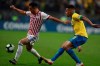 Paraguay's Ivan Piris, left, dribbles past Brazil's Gabriel Jesus during a Copa America quarterfinal soccer match at the Arena do Gremio in Porto Alegre, Brazil, Thursday, June 27, 2019. (AP Photo/Natacha Pisarenko)