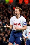 Tottenham's Harry Kane celebrates after scoring his side first goal during the English League Cup semifinal first leg soccer match between Tottenham Hotspur and Chelsea at Wembley Stadium in London, Tuesday, Jan. 8, 2019. (AP Photo/Frank Augstein)