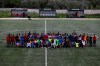In this Saturday, May 4, 2019, Cosmos FC players pose for a photograph at a soccer field in Moria village, on the northeastern Aegean island of Lesbos, Greece. A 10-minute walk from Europe‚Äôs largest refugee camp is a place where residents of the Moria camp on the Greek island of Lesbos can briefly forget about their tiny container-homes and crowded tents and instead worry about corner kicks and throw-ins. Many of the players hope to turn professional and leave the camp, where they are forced to remain indefinitely under European Union rules designed to limit the number of migrants and refugees reaching the mainland. (AP Photo/Thanassis Stavrakis)