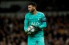 Tottenham's goalkeeper Hugo Lloris holds the ball during the Champions League group B soccer match between Tottenham and Bayern Munich at the Tottenham Hotspur stadium in London, Tuesday, Oct. 1, 2019. (AP Photo/Matt Dunham)