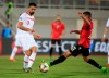 Turkey's defender Hasan Ali Kaldirim. left, and Albania's midfielder Myrto Uzuni fight for the ball during the Euro 2020 group H qualifying soccer match between Albania and Turkey at Loro Borici stadium, in Shkoder, northern Albania, Friday, March 22, 2019. (AP Photo/Hektor Pustina)