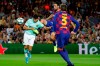Barcelona's Sergio Busquets, center, tries to stop Inter Milan's Alexis Sanchez during the group F Champions League soccer match between F.C. Barcelona and Inter Milan at the Camp Nou stadium in Barcelona, Spain, Wednesday, Oct. 2, 2019. (AP Photo/Emilio Morenatti)