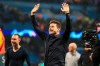 Tottenham coach Mauricio Pochettino waves to the fans during the Champions League quarterfinal, second leg, soccer match between Manchester City and Tottenham Hotspur at the Etihad Stadium in Manchester, England, Wednesday, April 17, 2019. (AP Photo/Jon Super)