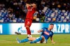 Liverpool's Mohamed Salah reacts during the Champions League Group E soccer match between Napoli and Liverpool, at the San Paolo stadium in Naples, Italy, Tuesday, Sept. 17, 2019. (AP Photo/Gregorio Borgia)