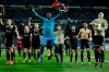 Ajax players celebrate after the Champions League round of 16 second leg soccer match between Real Madrid and Ajax at the Santiago Bernabeu stadium in Madrid, Tuesday, March 5, 2019. Ajax won 4-1. (AP Photo/Bernat Armangue)