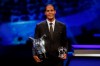 Dutch soccer player Virgil van Dijk of Liverpool holds the award of men's player of the year 2018/19 during the group stage draw at the Grimaldi Forum, in Monaco, Thursday, Aug. 29, 2019. (AP Photo/Daniel Cole)