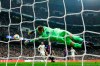 Barcelona goalkeeper Marc-Andre ter Stegen makes a save during the Copa del Rey semifinal second leg soccer match between Real Madrid and FC Barcelona at the Bernabeu stadium in Madrid, Wednesday, Feb. 27, 2019. Barcelona won 3-0. (AP Photo/Manu Fernandez)
