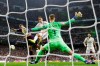 Barcelona goalkeeper Marc-Andre ter Stegen makes a save during the Copa del Rey semifinal second leg soccer match between Real Madrid and FC Barcelona at the Bernabeu stadium in Madrid, Wednesday, Feb. 27, 2019. Barcelona won 3-0. (AP Photo/Manu Fernandez)