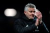 Manchester United coach Ole Gunnar Solskjaer applauds after the Champions League quarterfinal, first leg, soccer match between Manchester United and FC Barcelona at Old Trafford stadium in Manchester, England, Wednesday, April 10, 2019. Barcelona won 1-0. (AP Photo/Jon Super)