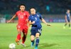 Myanmar's Kaung Sithu, left, vies for the ball with Japan's Auto Nagatomo during their FIFA World Cup 2022 qualifying soccer match at Thuwunna Stadium, Tuesday, Sept. 10, 2019, in Yangon, Myanmar. (AP Photo/Thein Zaw)