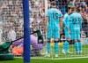 Medical staff attend to Tottenham's goalkeeper Hugo Lloris during the English Premier League soccer match between Brighton and Hove Albion and Tottenham Hotspur at Falmer stadium in Brighton, England Saturday, Oct. 5, 2019. (AP Photo/Kirsty Wigglesworth)