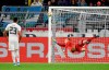 Germany's goalkeeper Marc-Andre Ter Stegen dives to deflect the ball during the international friendly soccer match between Germany and Argentina at the Signal Iduna Park stadium in Dortmund, Germany, Wednesday, Oct. 9, 2019. (AP Photo/Martin Meissner)