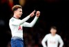 Tottenham's Dele Alli celebrates after scoring his side's second goal during the English League Cup quarter final soccer match between Arsenal and Tottenham Hotspur at the Emirates stadium in London, Wednesday, Dec. 19, 2018. (AP Photo/Frank Augstein)