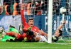 Bayern's Thomas Mueller, center, celebrates after scoring his side's second goal during the German soccer cup, DFB Pokal, second round match between VfL Bochum and Bayern Munich at the Vonovia Ruhrstadion stadium, in Bochum, Germany, Tuesday, Oct. 29, 2019. (AP Photo/Martin Meissner)