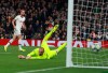 Tottenham's Harry Kane scores his side's fifth goal during the Champions League, group B, soccer match between Tottenham and Red Star Belgrade, at the Tottenham Hotspur stadium in London, Tuesday, Oct. 22, 2019. (AP Photo/Ian Walton)