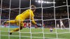 United States goalkeeper Alyssa Naeher saves a penalty shot taken by England's Steph Houghton during the Women's World Cup semifinal soccer match between England and the United States, at the Stade de Lyon, outside Lyon, France, Tuesday, July 2, 2019. (AP Photo/Alessandra Tarantino)