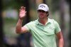 Nacho Elvira of Spain waves to the crowd at the 18th hole at the Malaysia Golf Championship 3rd round in Kuala Lumpur, Malaysia, Saturday, March 23, 2019. (AP Photo/Vincent Phoon)