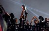 PAOK players raise a trophy as they celebrate their Greek Super League championship title in Thessaloniki, northern Greece, on Sunday, April 21, 2019. PAOK won the Greek league with a round to spare after beating Levadiakos 5-0, 34 years after the last time the team won the championship. (AP Photo/Giannis Papanikos)