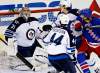 Adam Hunger / REUTERS
Jets goalie Ondrej Pavelec keeps his eye on the flying puck before making a save during second-period action at Madison Square Garden in New York Tuesday.