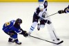 Jasen Vinlove / USA Today Sports
Winnipeg right-winger Blake Wheeler, right, zips past the check of Blues' centre Derek Roy during Monday night's action.