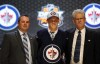 USA Today Sports
Nikolaj Ehlers with team officials after being selected as the number nine overall pick to the Winnipeg Jets in the first round of the 2014 NHL Draft.