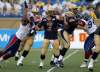 Trevor Hagan / Winnipeg Free Press
Winnipeg Blue Bombers' Alex Brink (7) is sacked by Montreal Alouettes' John Bowman (7) Friday at Canad Ins Stadium.