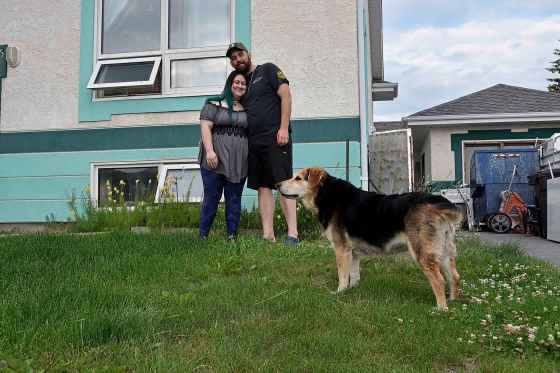 Miranda and Joel Atkinson, with their dog Fenris, still keep their kids inside but are opening the windows and are eager to get back to the all-too-short summer in Gillam, Man., two weeks after the last confirmed sighting of two B.C. men wanted for murder.