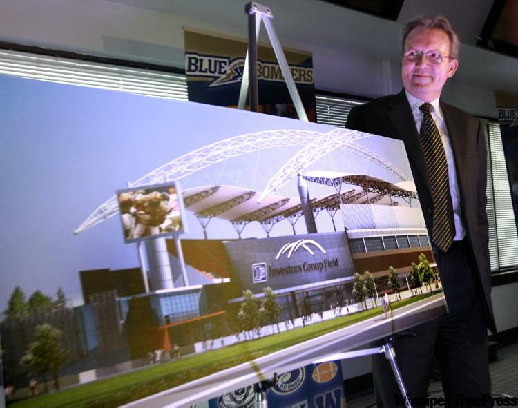 WAYNE GLOWACKI/WINNIPEG FREE PRESS
Murray Taylor, president and CEO of Investors Group, at the news conference Wednesday with an illustration showing the new stadium with name.