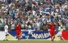 Honduras's Carlos Costly, center, celebrates after scoring while Canada's players David Edgar, left, and Nik Ledgerwood react during a 2014 World Cup qualifying soccer match in San Pedro Sula, Honduras, Tuesday, Oct 16, 2012. Canadian soccer officials had hoped to be in Miami on Thursday, meeting with CONCACAF officials to map out the final round of World Cup qualifying.Instead, in the wake of a humiliating 8-1 defeat in Honduras, they find themselves forced to do yet another post-mortem on the men's soccer program. THE CANADIAN PRESS/AP-Esteban Felix