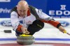 Canada's skip Kevin Koe competes in a round robin match between Scotland and Canada at the men's curling World Championships in the St. Jakobshalle in Basel, Switzerland, Monday, April 4, 2016. (Georgios Kefalas/Keystone via AP)
