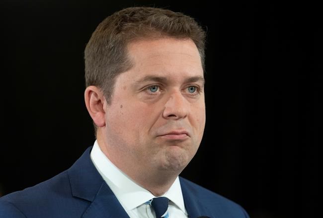 Conservative leader Andrew Scheer reacts to a question following as he takes questions from the media in Toronto, Saturday, October 19, 2019. THE CANADIAN PRESS/Adrian Wyld