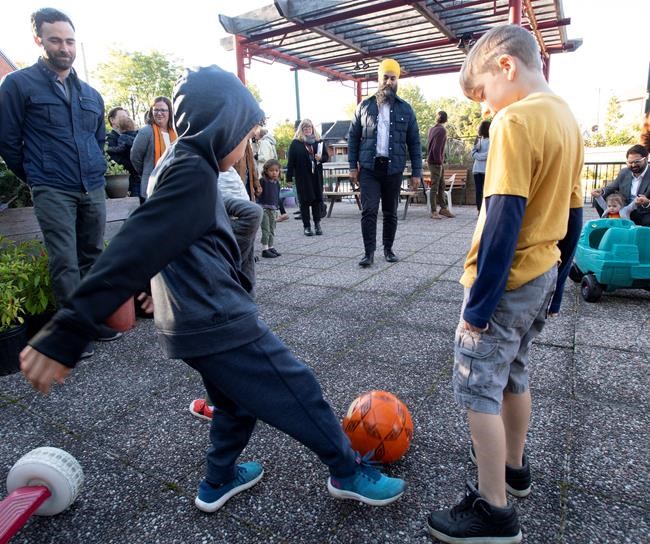 NDP leader Jagmeet Singh plays soccer with boys as he makes a campaign stop in Ottawa, Que. Tuesday September 17, 2019. THE CANADIAN PRESS/Adrian Wyld