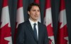 Prime Minister Justin Trudeau speaks with reporters as he takes part in a news conference to mark the end of the parliamentary session Wednesday June 22, 2016 in Ottawa. THE CANADIAN PRESS/Adrian Wyld