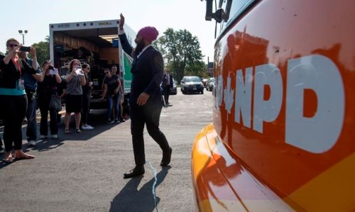 NDP Leader Jagmeet Singh swaves as he arrives at a campaign event in Essex, Ont., Friday, Sept. 20, 2019. THE CANADIAN PRESS/Adrian Wyld