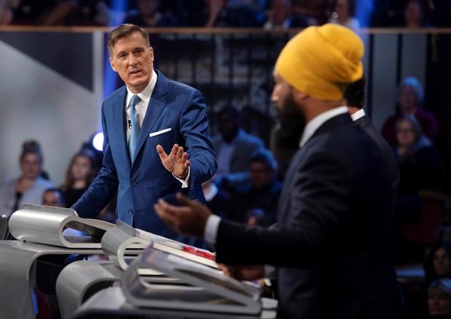 People's Party of Canada leader Maxime Bernier responds to NDP leader Jagmeet Singh during the Federal leaders debate in Gatineau, Que. on Monday October 7, 2019. THE CANADIAN PRESS/Justin Tang
