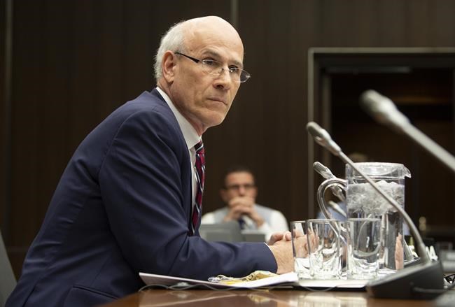 Clerk of the Privy Council Michael Wernick waits to appear before the Justice Committee meeting in Ottawa, Thursday February 21, 2019. THE CANADIAN PRESS/Adrian Wyld