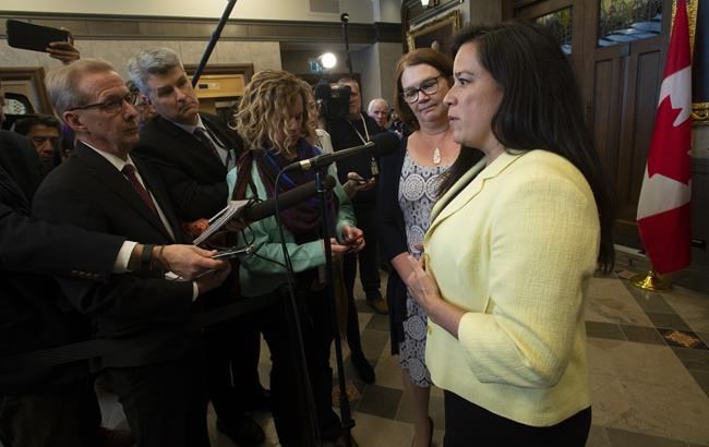 Independent Members of Parliament Jane Philpott and Jody Wilson-Raybould speak with the media before Question Period in the Foyer of the House of Commons in Ottawa, Wednesday April 3, 2019. THE CANADIAN PRESS/Adrian Wyld