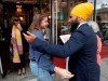 NDP Leader Jagmeet Singh speaks with ladies as they leave a shop in Saint-Hyacinthe, Que. Sunday, September, 15, 2019. As the federal election campaign began last week, Canada's main political parties couldn't escape Quebec's internal politics and a renewed nationalism championed by the provincial government.THE CANADIAN PRESS/Adrian Wyld