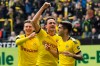 Dortmund's Christian Pulisic celebrates his opening goal with Thomas Delaney and Lukasz Piszczek, from right, during the German Bundesliga soccer match between Borussia Dortmund and Fortuna Duesseldorf in Dortmund, Germany, Saturday, May 11, 2019. (AP Photo/Martin Meissner)
