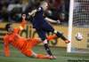 LUCA BRUNO / THE ASSOCIATED PRESS
Spain’s Andres Iniesta (right) rifles the World Cup winning goal past the outstretched Rafael van der Vaart.