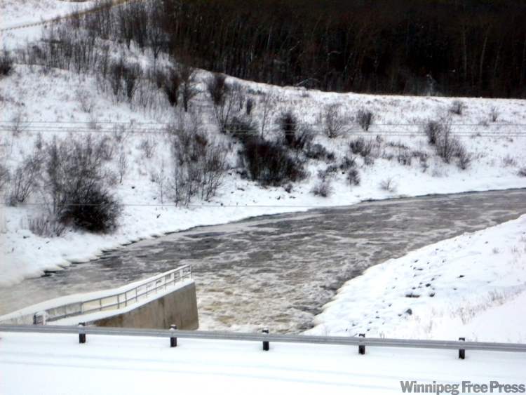 Neil Babaluk for the Winnipeg Free Press
The Assiniboine River at the Shellmouth Dam, Asessippi Provincial Park in December.