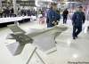 TREVOR HAGAN / THE CANADIAN PRESS
Maj.-Gen. Yvan Blondin and Chief Warrant Officer Guy St-Jean look over a model of the F-35 fighter jet at Bristol plant.