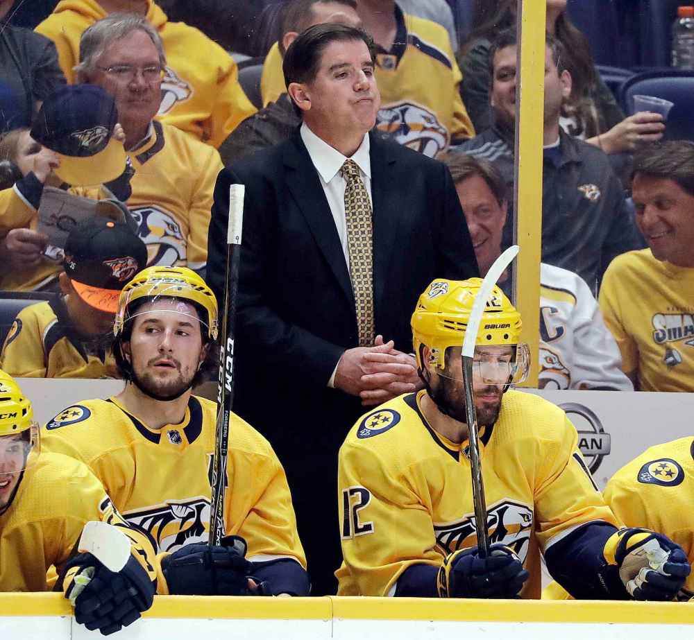 Nashville Predators coach Peter Laviolette watches during the third period in Game 5 of the team's NHL hockey second-round playoff series against the Winnipeg Jets on Saturday, May 5, 2018, in Nashville, Tenn. The Jets won 6-2 to take a 3-2 lead in the series. (AP Photo/Mark Humphrey)
